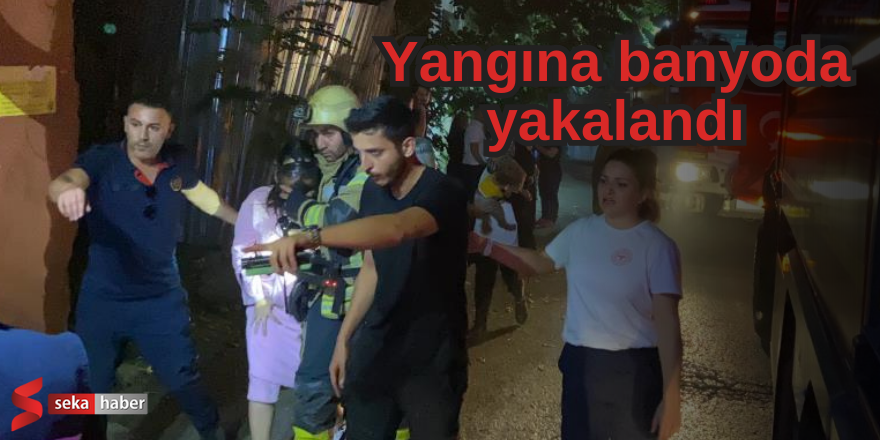 Yangına banyoda yakalandı